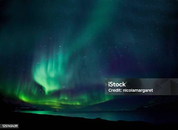 The Northern Lights Aurora Borealis In Blue And Green Stock Photo - Download Image Now