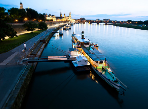 Skyline of Düsseldorf Media Harbor, a barge in the foreground.