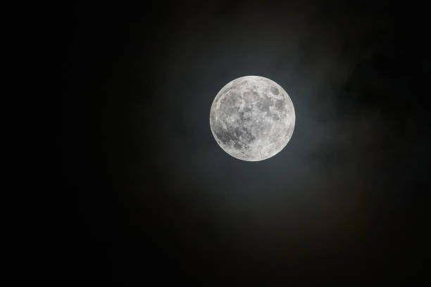 Penumbral Lunar Eclipse Image of the moon during the Penumbral Lunar Eclipse penumbral lunar eclipse stock pictures, royalty-free photos & images