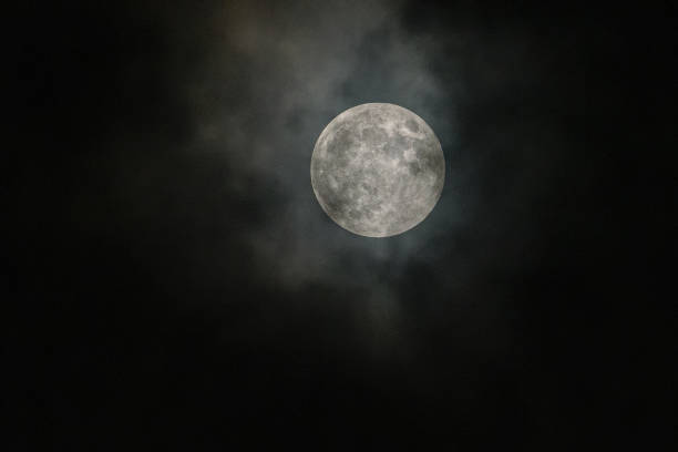 Penumbral Lunar Eclipse Image of the moon during the Penumbral Lunar Eclipse penumbral lunar eclipse stock pictures, royalty-free photos & images