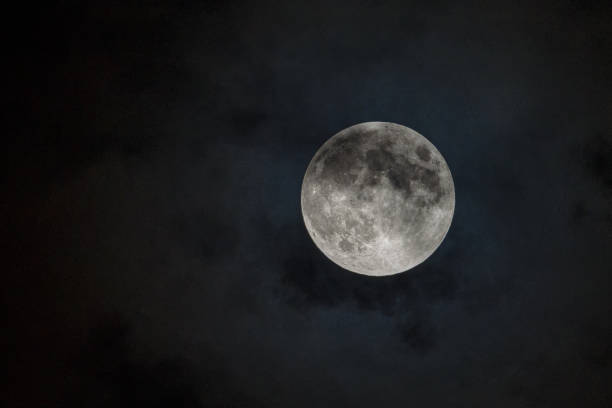 Penumbral Lunar Eclipse Image of the moon during the Penumbral Lunar Eclipse lunar eclipse stock pictures, royalty-free photos & images