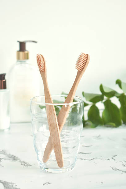 istock Bamboo toothbrushes are eco-friendly with a copy of the space on a white background. Zero waste. Without plastic. Top view. 1251457138