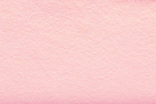 fine grain pink woolen felt. texture background. velvet scarlet matte background of suede fabric - matte imagens e fotografias de stock