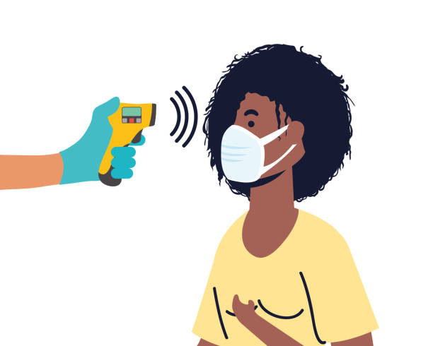 istock check temperature with laser thermometer to afro female patient 1251459711