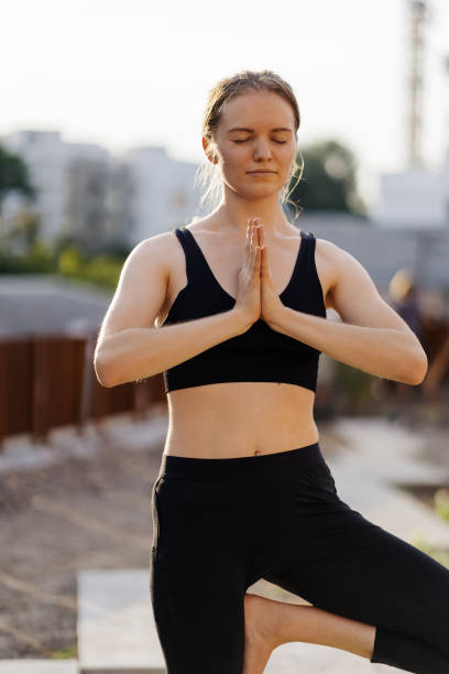 istock Young girl practicing stretching and yoga workout exercise 1251459712