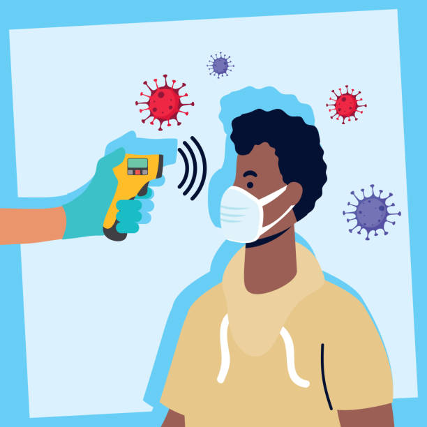istock check temperature with laser thermometer to afro male patient 1251459806