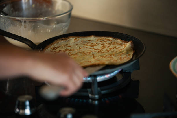 istock Cooking pancakes in the kitchen 1251463717
