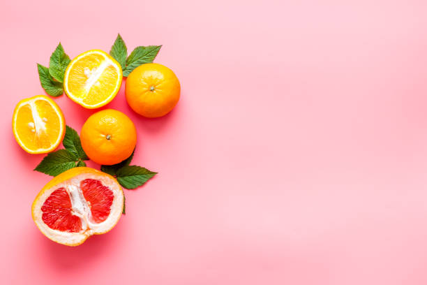 istock Grapefruit and orange citrus fruits top view 1251465818