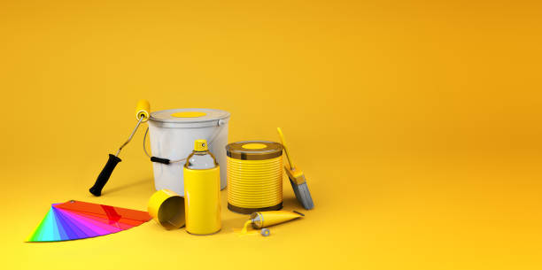 equipment for home renovation - house painter paint roller yellow painting imagens e fotografias de stock