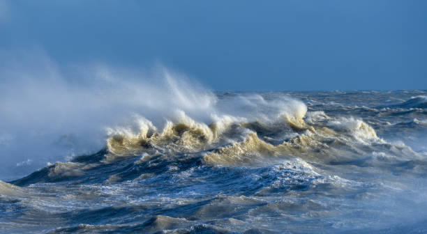 istock Amzing image of individual wave breaking and cresting during violent windy storm with superb wave detail 1251468727