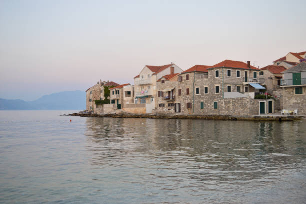istock Traditional Dalmatian stone architecture, town Postira at sunset 1251470889