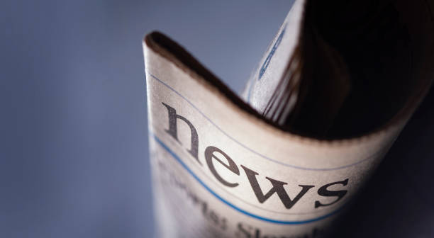 Newspaper headlines roll shown daily newspapers
