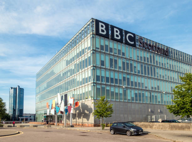 Glasgow, Scotland - People outside the entrance to the BBC's Scottish headquarters building on the south of the Clyde in Glasgow.