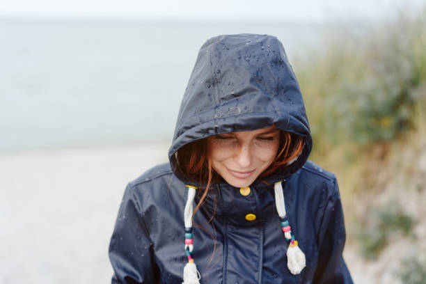 istock Thoughtful young woman smiling quietly to herself 1251480959