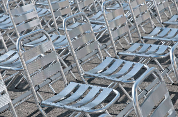 istock Empty chairs of an outdoor location. 1251482162