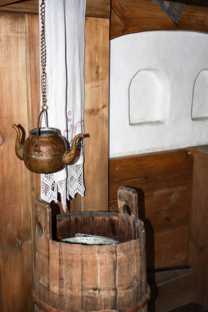 istock Copper vessel for drinking water (kettle with two spouts) in the interior 1251486862