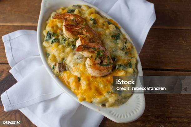 Mac N Cheese With Shrimp Shrimp Sautéed In Organic Butter Garlic And Served With Pan Seared Asparagus Jumbo Lump Crab Cake Cauliflower Broccoli And Potatoes Classic American Restaurant Or French Bistro Entree Favorite Stock Photo - Download Image Now