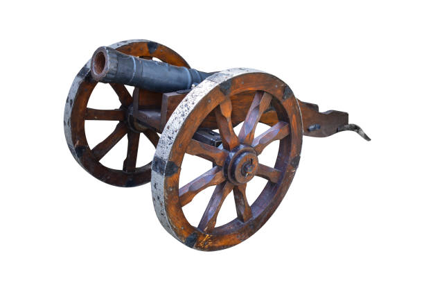 istock Old ancient cannon. Battle cannon from medieval ages isolated on white background 1251488515