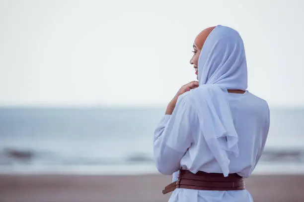 Photo of Beautiful Muslim Woman wearing hijab in the summer