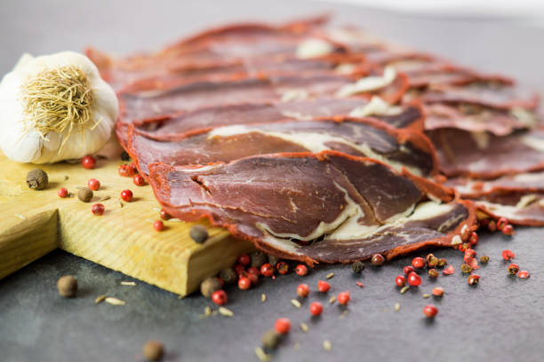 chopped bacon, pepper, spice, tomato and garlic - veal piccata imagens e fotografias de stock