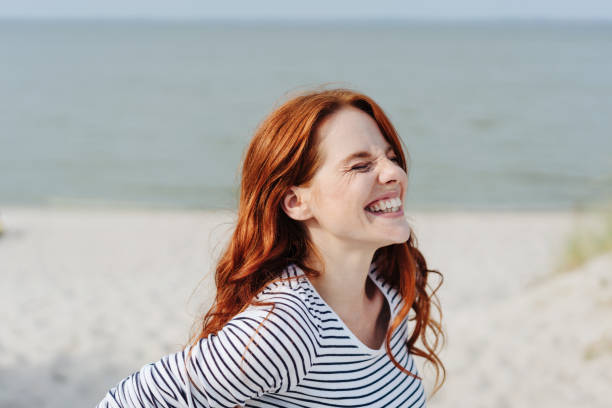 istock Cute young woman with a charismatic grin 1251491027