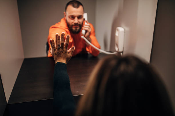 istock Young wife visit her husband in prison 1251492871