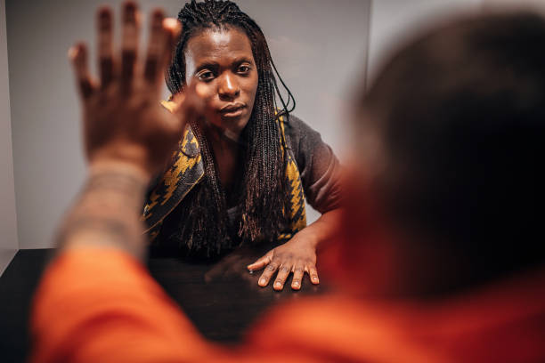 istock Young black woman visit her man in prison 1251493037