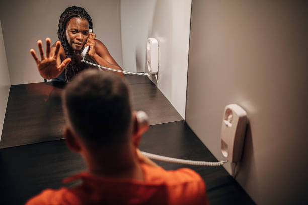 istock Young black woman visit her husband in prison 1251493059