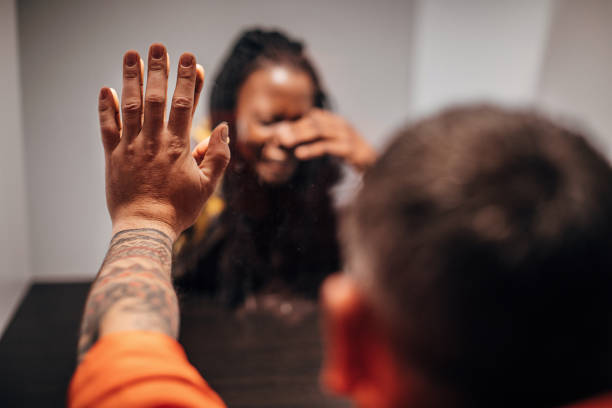 istock Young black wife visit her husband in prison 1251493574