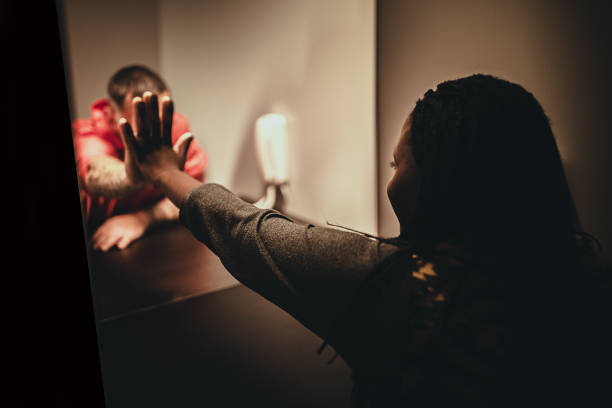 istock Woman and her man sitting in visiting room 1251493653