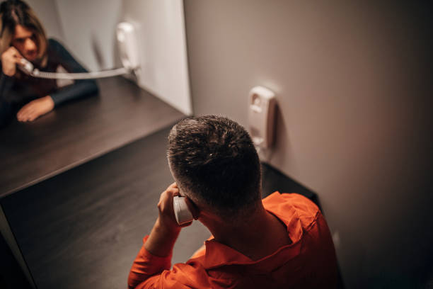 istock Woman and her husband sitting in visiting room 1251493692
