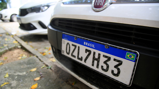 salvador, bahia / brazil - june 11, 2020: vehicle plate in the Mercosul standard is seen in the city of Salavador.\