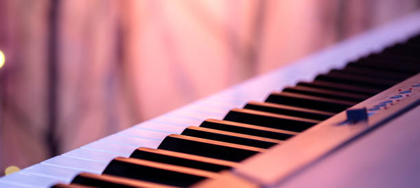 istock Piano keys on a beautiful colored background. 1251494178