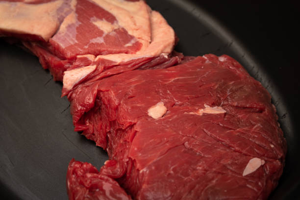 istock Raw meat ready to be seasoned. 1251500654