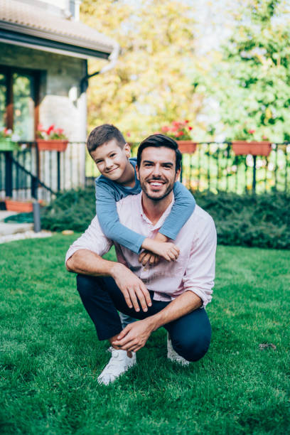 istock Father and son in the backyard. 1251502260