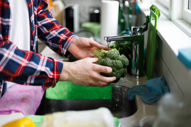 istock young man stay at home cooking 1251503909
