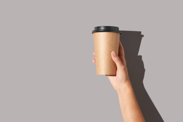 istock Girl hand hold coffee plastic cup 1251506124