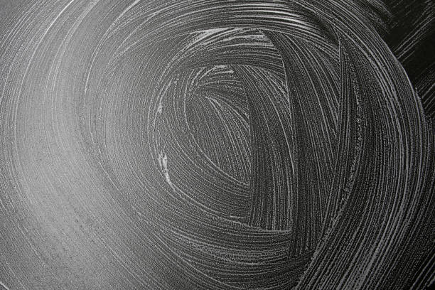 istock soap foam stains on a black background 1251509317
