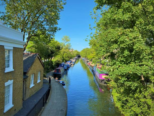 Regent's Canal in Little Venice, London London, United Kingdom - May 25 2020: View of Regent's Canal in Little Venice with clear blue sky little venice london stock pictures, royalty-free photos & images