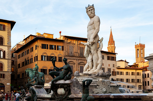 Florence, Italy - October 2019: The Fountain of Neptune (Fontana del Nettuno) situated on the Piazza della Signoria (Signoria square), in front of the Palazzo Vecchio, Florence, Italy