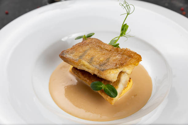 istock Fish grill on white plate in restaurant 1251514173