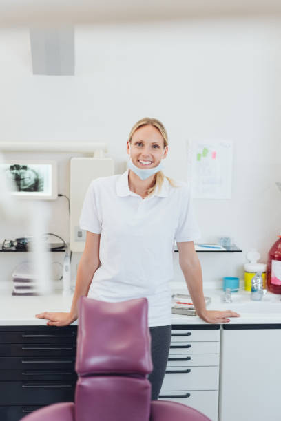 istock Happy relaxed smiling female dentist 1251515704