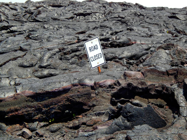 istock Dried Lava Flow Overtaking Street Sign 1251516756