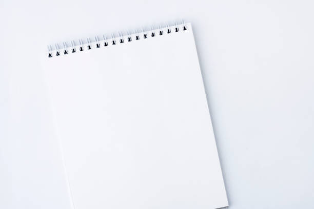 white open notebook. white notebook with spiral mount pages, on a white background. copy space - spiral notebook spiral ring binder blank imagens e fotografias de stock