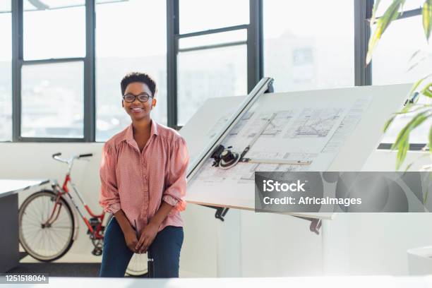 Portrait Of A Confident Young Architect In A Modern Office Stock Photo - Download Image Now