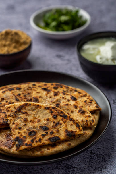 istock stuffed sattu paratha with homemade curd for breakfast 1251521918