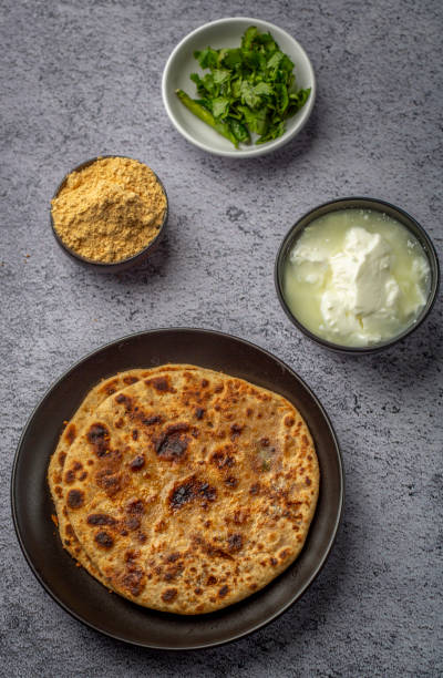 istock stuffed sattu paratha with homemade curd for breakfast 1251522029