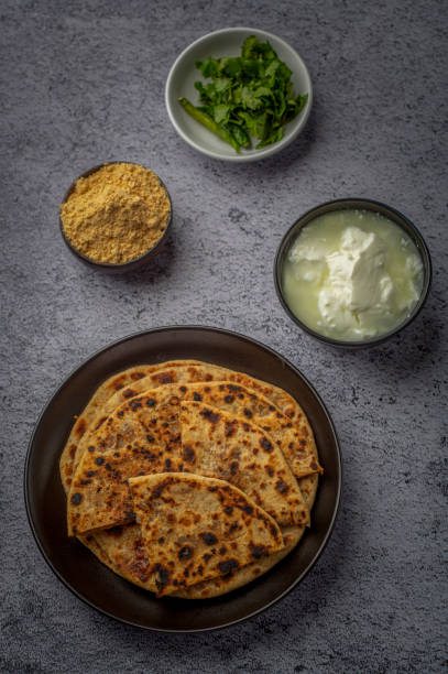 istock stuffed sattu paratha with homemade curd for breakfast 1251522131