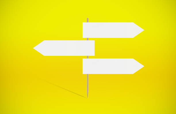 istock Empty 3 Way Arrow Signboard On Yellow Background 1251522491