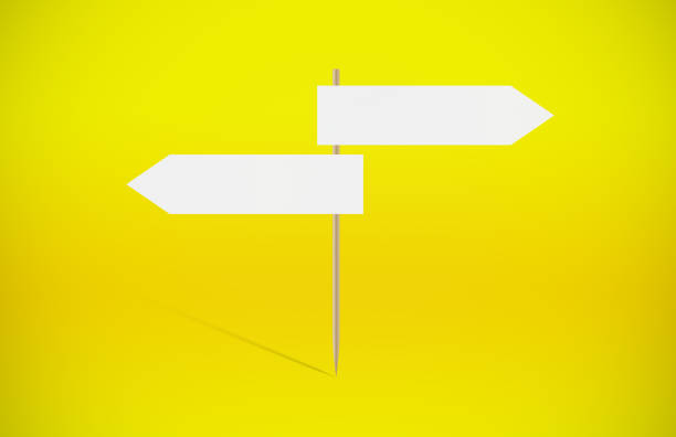 istock Empty 2 Way Arrow Signboard On Yellow Background 1251522555